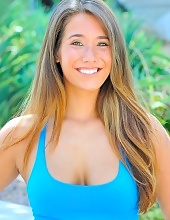 Eva Lovia Posing In Cute Shorts And A Blue Top